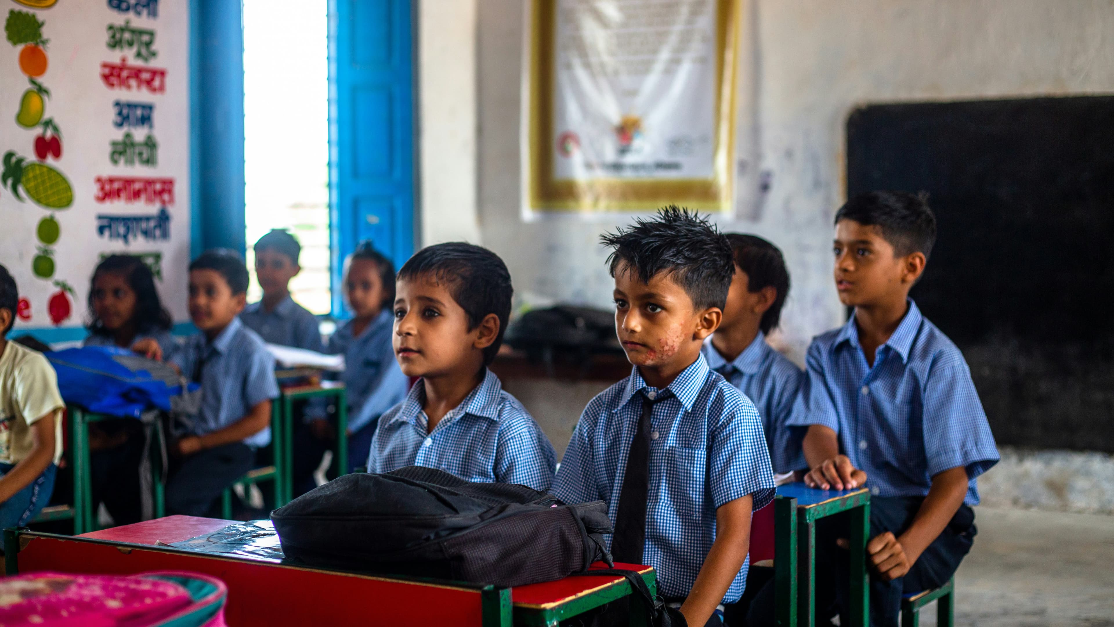 Students in a government-school classroom